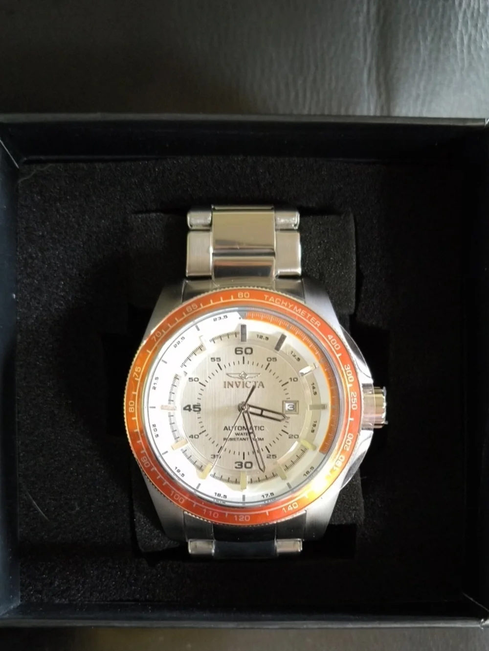 Invicta Men’s Silver Watch with Orange Bezel and Cream Dial